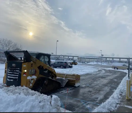 Commercial snow removal for a parking lot in Edmonton.