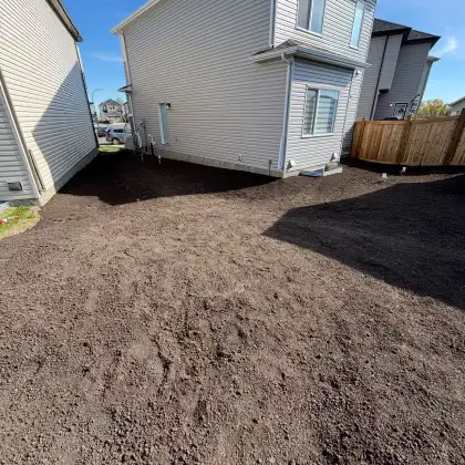 Final grading service in Edmonton for proper drainage and city compliance.