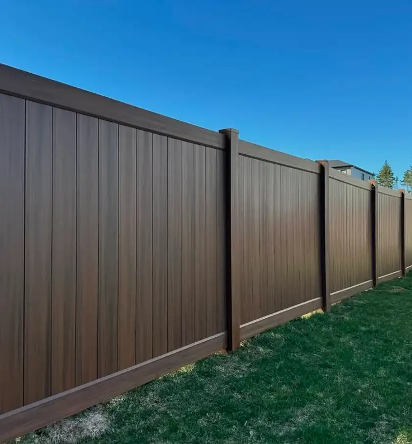 Modern vinyl fence installed in Riverbend by Serene Landscaping.